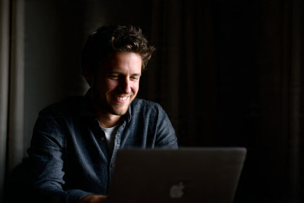 a_man_early_30s_closing_a_laptop(3)