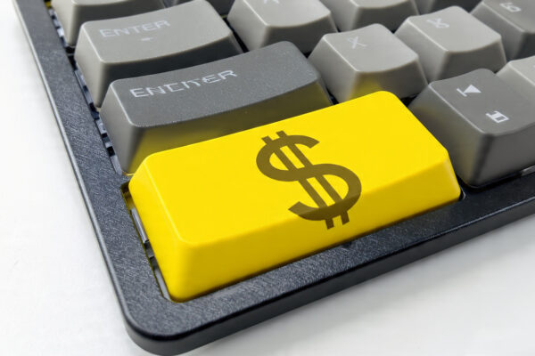 a_computer_keyboard_with_a_dollar_sign a_computer_keyboard_with_a_dollar_sign