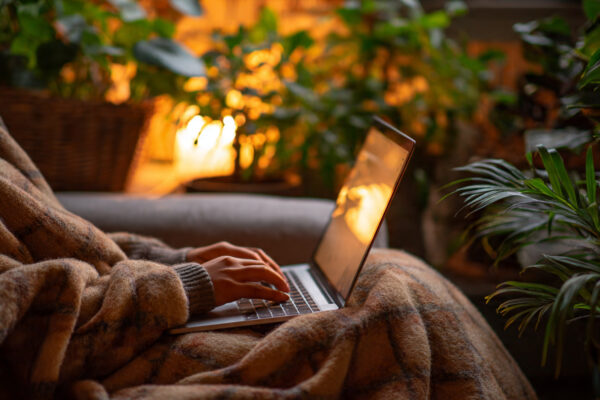 a_person_working_comfortably_on_a_laptop a_person_working_comfortably_on_a_laptop